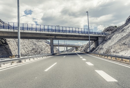Bridge over a highway.の写真素材