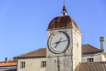 TROGIR, CROATIA - 11 JULY,2017: Clock on the tower of the main square of Trogir., a popular tourist destination in Croatia.のeditorial素材
