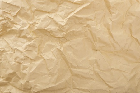Crumpled or wrinkled paper as an background.の写真素材