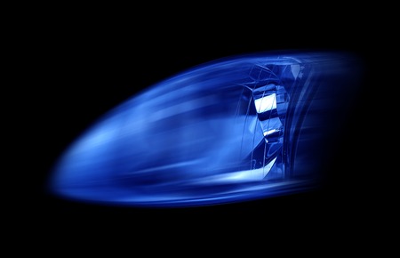 Modern automotive headlight on a black background shine blue light.の写真素材