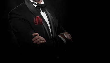 Young handsome man in black suit.の写真素材