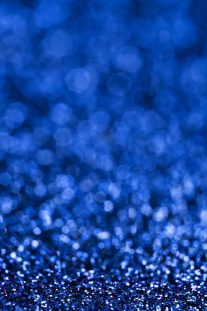 Shiny blue abstract christmas background. Blue glitter.の写真素材