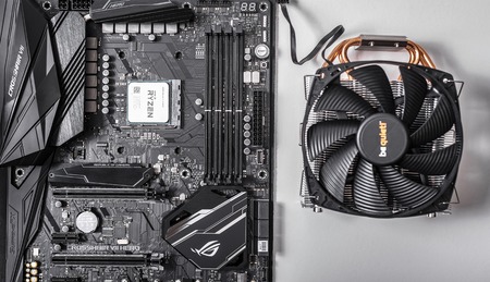 Processor Ryzen 7 2700X against the background of a computer motherboard Asus rog crosshair vii hero, and cooler be quiet .のeditorial素材