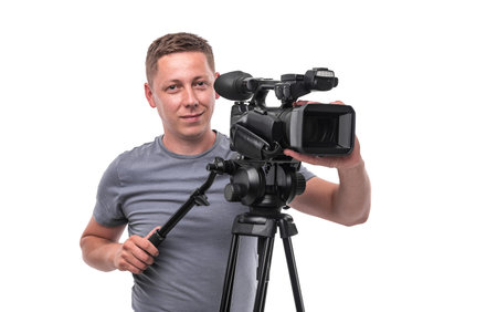 Video camera operator isolated on a white background.