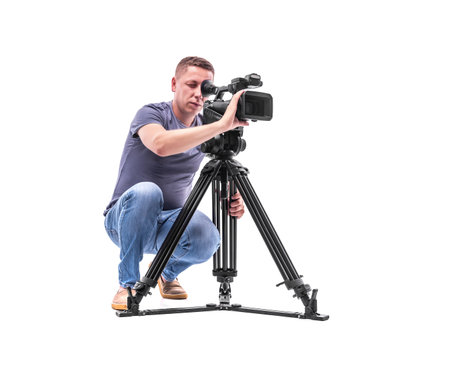 Video camera operator isolated on a white background.