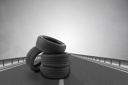 Car tires on an asphalt road.の写真素材