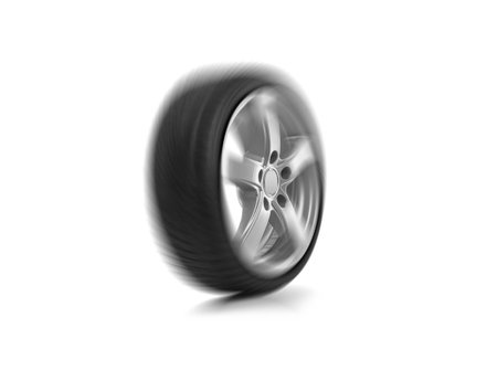 Spinning car wheel on a white background.