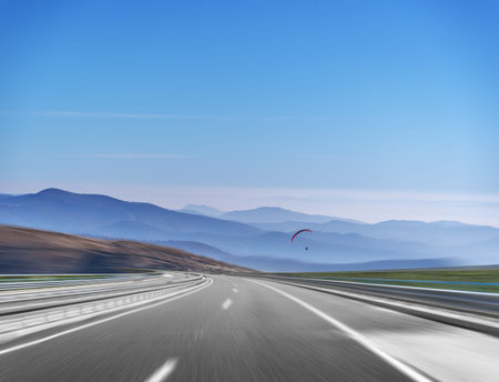 Mountain highway with blue sky.