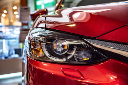 Modern car headlight close-up.