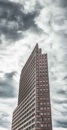 A tall building against an overcast sky.