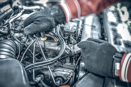 Disassembled engine of an old car. Auto repair.の写真素材