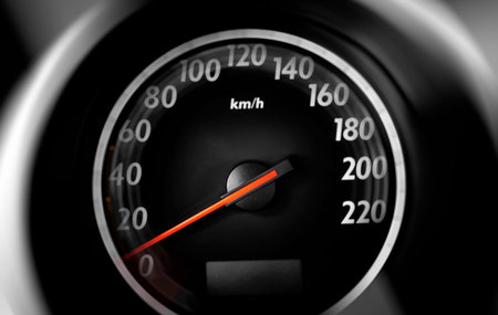 Car speedometer, close up.