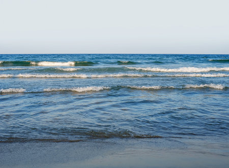 Waves at sea or ocean in the evening.