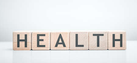 Health word made with building wooden blocks.の写真素材