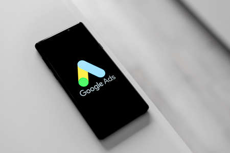 Google Ads logo displayed on a smartphone screen.のeditorial素材
