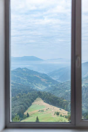 Mountain landscape in the window.の写真素材