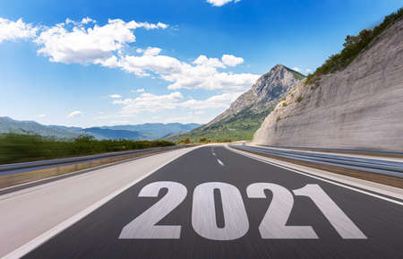 New two thousand and twenty first year. 2021 year. Figures 2021 on a suburban highway. Concept.の写真素材