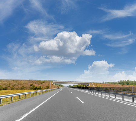 Bridge and suburban highway on a sunny day