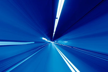 Road in an underground tunnel. Shooted with motion blur.の写真素材