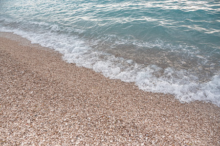 Sea surf on a stony beach.