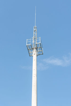 Concrete tower with antennas against the sky.