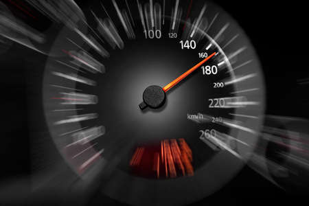 The speedometer of a modern car shows a high driving speed.の写真素材