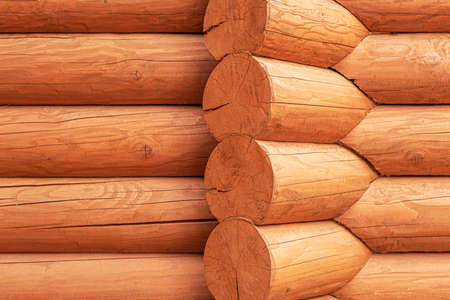 Texture of a wooden blockhouse made of logs.の写真素材