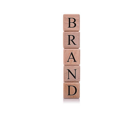 Brand. Wooden cubes with the word brand on a white background.の写真素材