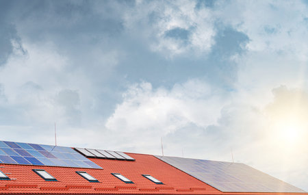 Solar panel power plant on the roof of house.