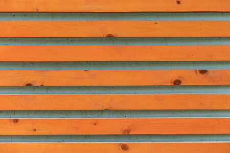 Texture of a wooden blockhouse made of logs.