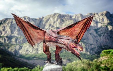 Dragon sitting on a rock.