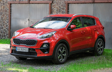 KIA Sportage parked near the building, in Voevodyno, Ukraine.
