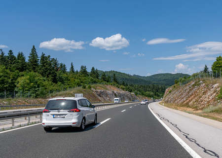White Opel Zafira on the highway in Zadar, Croatia.のeditorial素材