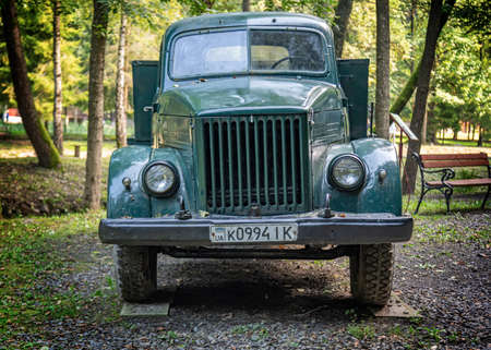 An old GAZ-51 truck in a parking lot, in Voevodyno, Ukraine.のeditorial素材