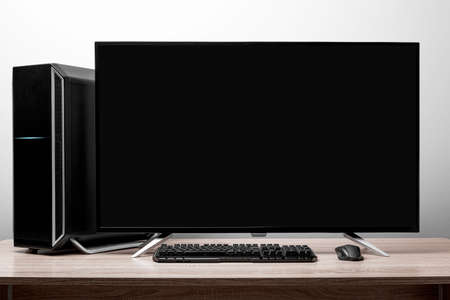Workplace. Table with a desktop personal computer.の写真素材
