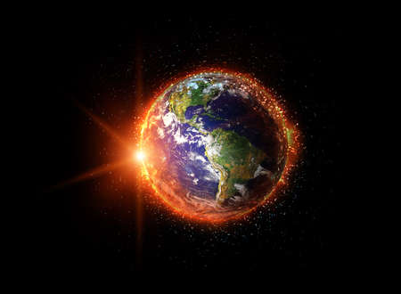 Planet Earth on fire in outer space.の写真素材