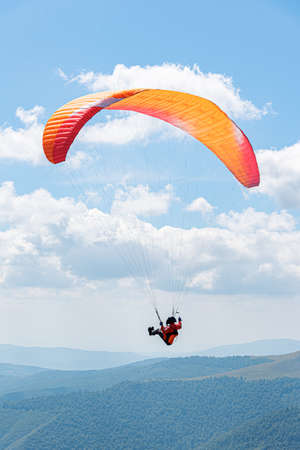 Paragliding on the background of the skys.の写真素材