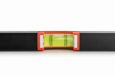 Magnetic building level isolated on white.
