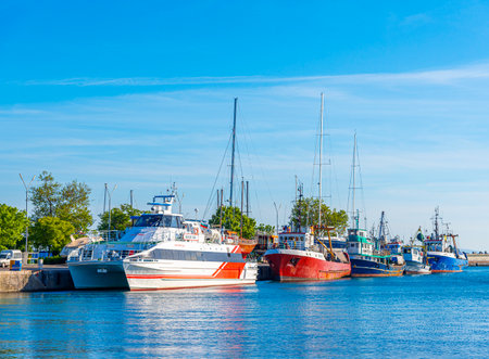 Fishing boats in the bay against the background of the old town of Nessebar, Bulgaria.のeditorial素材