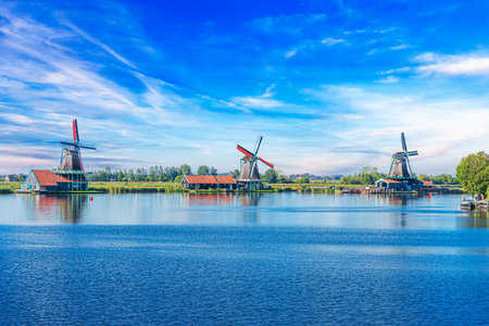Panorama of traditional dutch houses at the Zaan river in Zaandijk, Netherlands.の写真素材