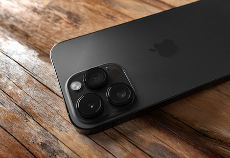 New Apple iPhone 14 Pro Max Space Black on a wooden background.