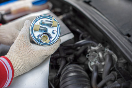 Replacing the fuel filter of car.の写真素材