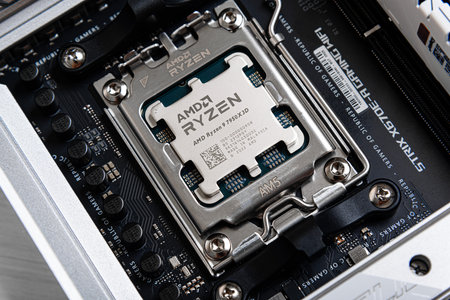 AMD Ryzen 9 7950X3D processor before being installed on the motherboard.