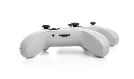 White wireless gamepad controller joystick isolated on a white.の写真素材