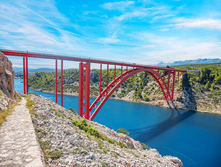 Iron arch bridge with a road.の写真素材
