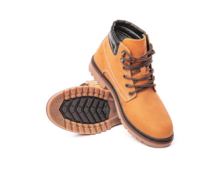 Yellow winter boot isolated on white.の写真素材