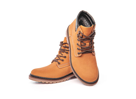 Yellow winter boot isolated on white.の写真素材