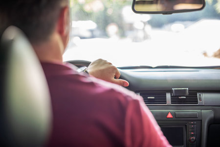 Silhouette of a man driver.