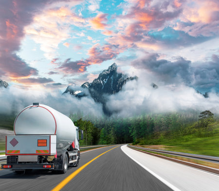 Fuel truck on a picturesque road.の写真素材