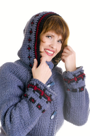 Smiling girl in winter style on a white background 